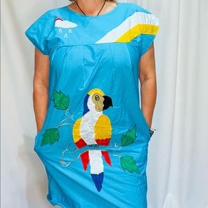 No tags, maybe home sewn. The colors are spectacular! Fits size 12